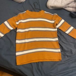 Orange sweater with white/grey stripes!